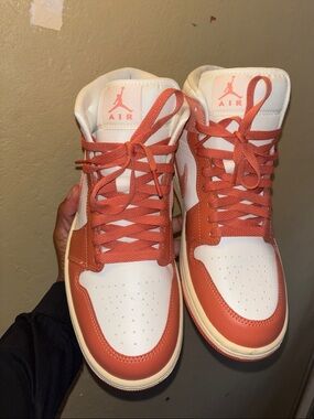 Jordan 1 Mid Sneakers in White and Pink